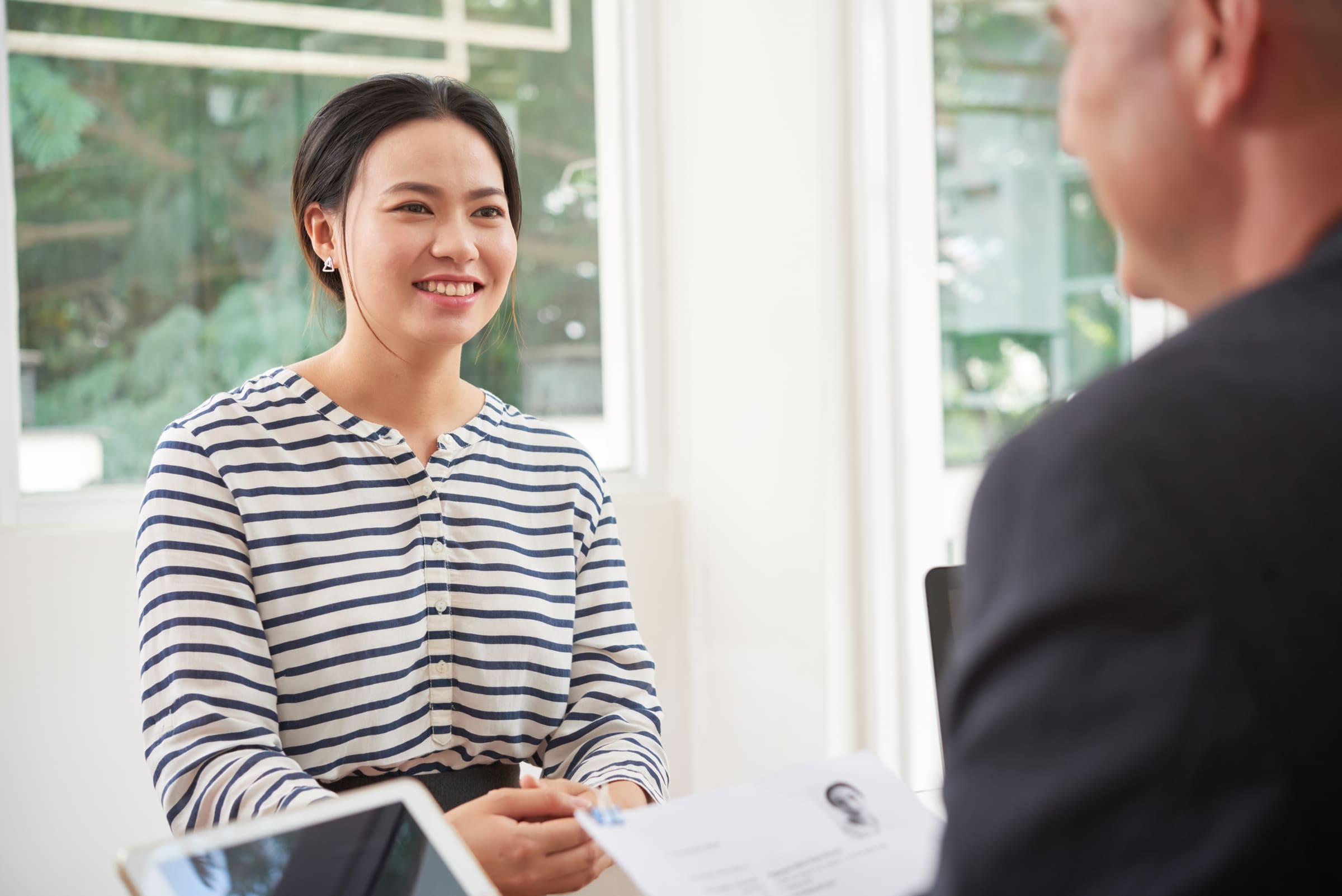 Chinese woman at an interview